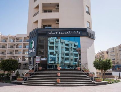 بنك التعمير والإسكان يعلن عن تأجيل الحجز على أراضي الصعيد